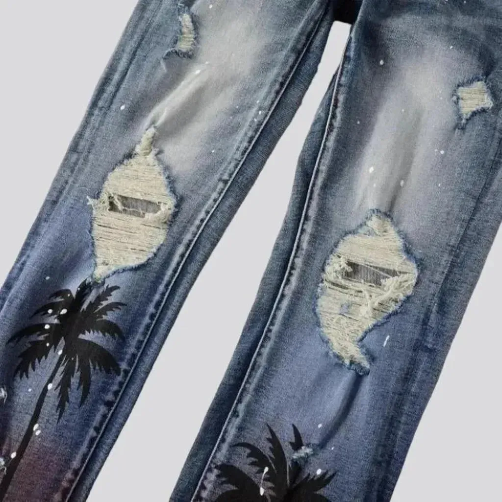 Distressed men's palms-print jeans